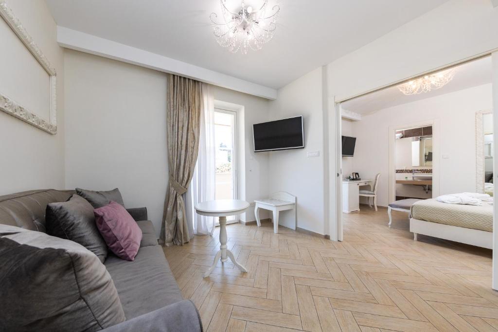 Posteľ alebo postele v izbe v ubytovaní Grand Hotel Park