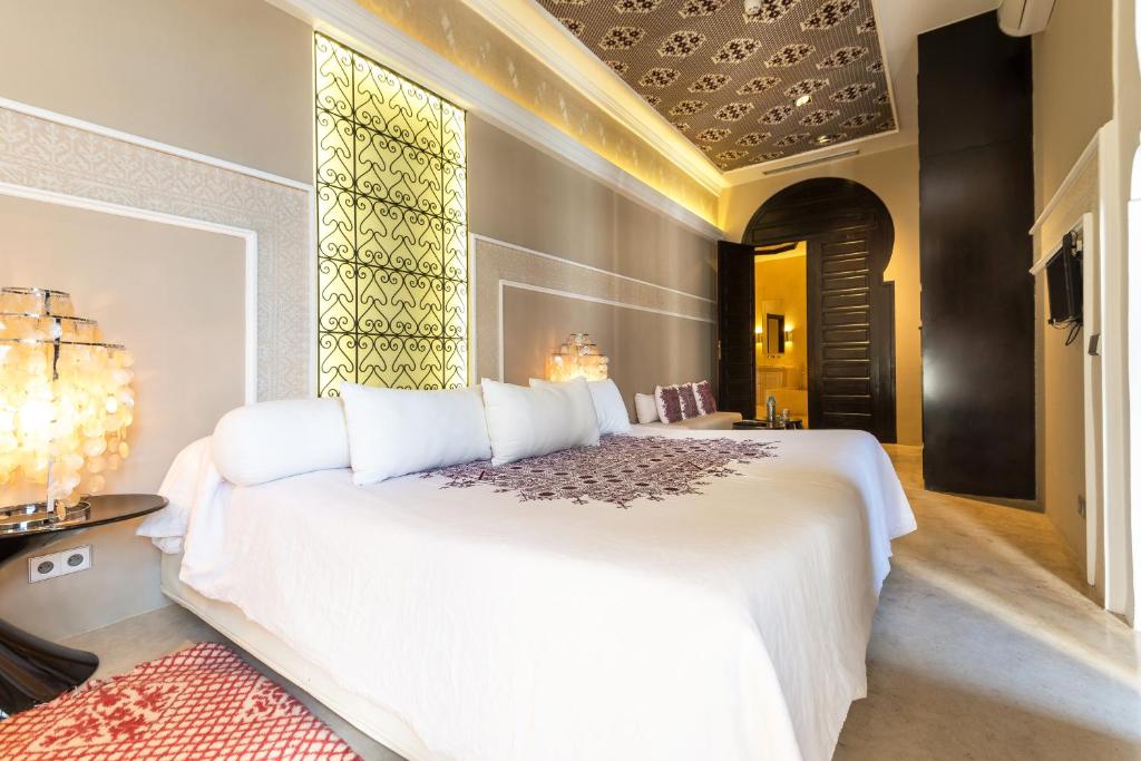 Postel nebo postele na pokoji v ubytování Riad Elisa & Spa