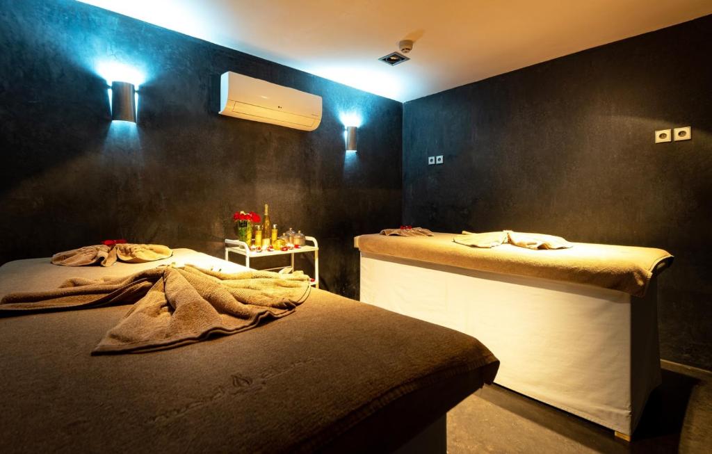 Postel nebo postele na pokoji v ubytování Riad Elisa & Spa