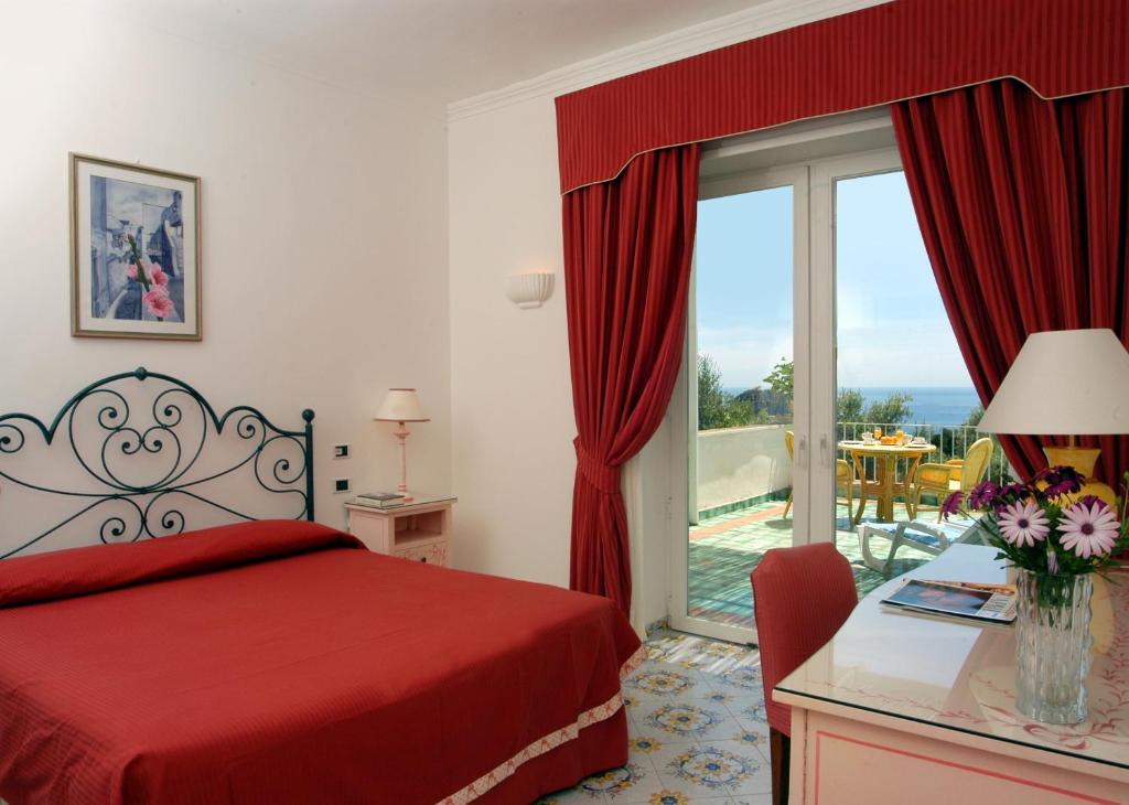 Postel nebo postele na pokoji v ubytování Hotel Canasta