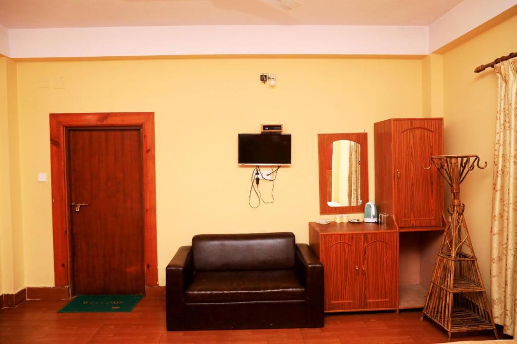 TV o dispositivi per l'intrattenimento presso Chitwan Forest Resort , Chitwan National Park