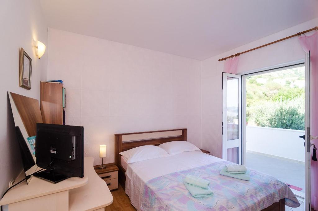Posteľ alebo postele v izbe v ubytovaní Leo's Room