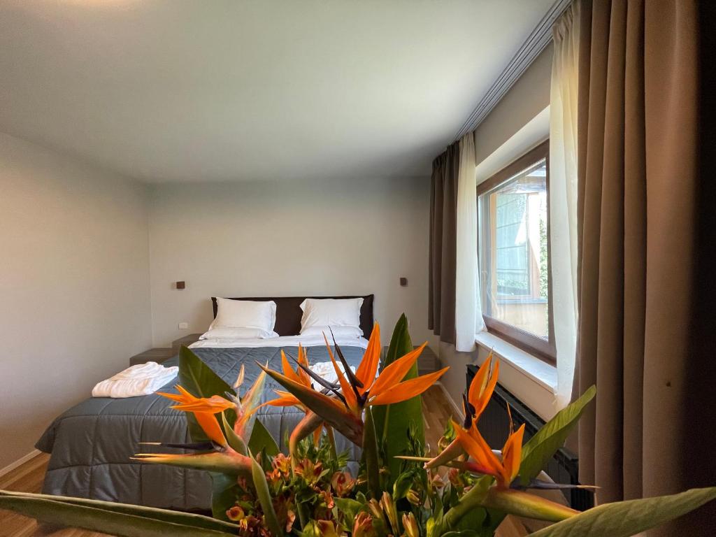 Postel nebo postele na pokoji v ubytování Aminta Resort