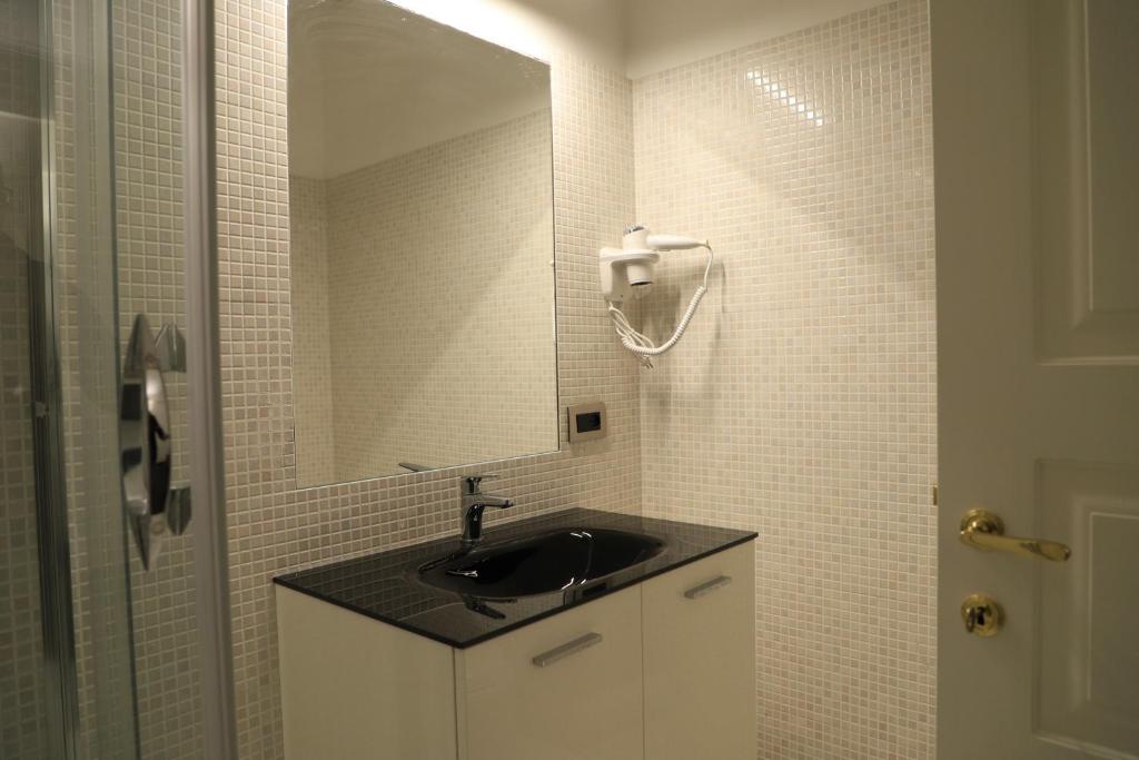 Koupelna v ubytování Gemelli Hotel