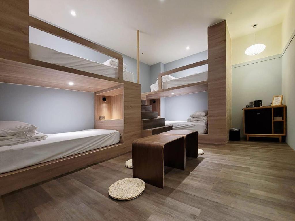 Voodi või voodid majutusasutuse Green Hotel - Midori toas