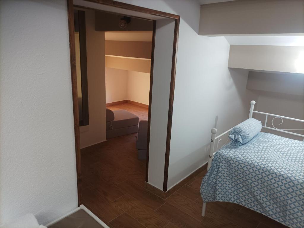 Postel nebo postele na pokoji v ubytování Casa La Piedra