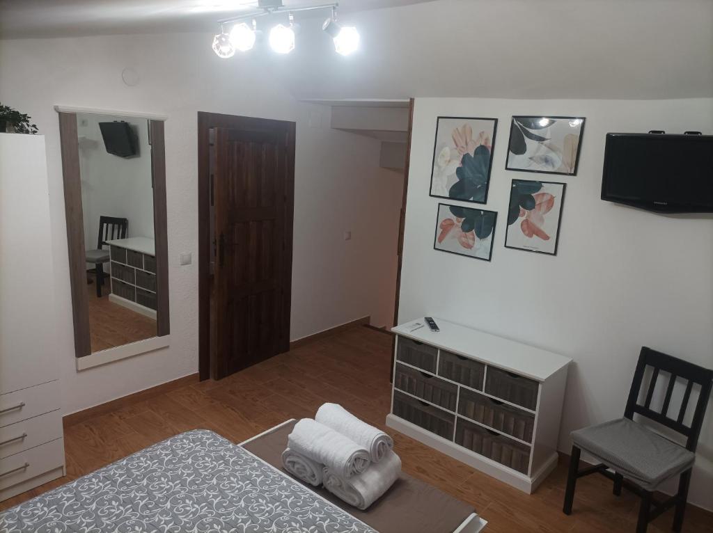 Postel nebo postele na pokoji v ubytování Casa La Piedra