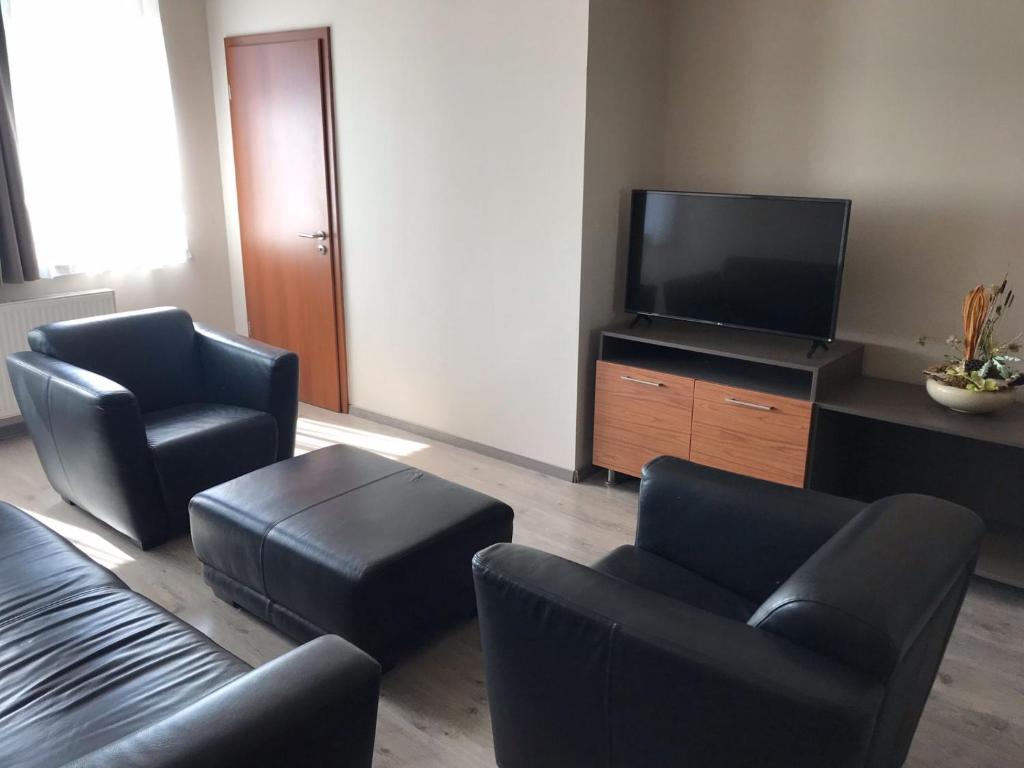 TV a/nebo společenská místnost v ubytování Centro Panzió