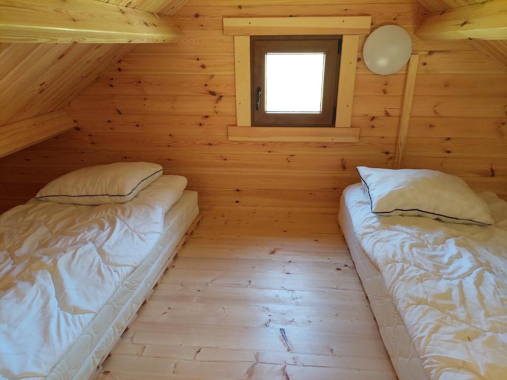 Postel nebo postele na pokoji v ubytování Stanica Wodna PTTK Sorkwity