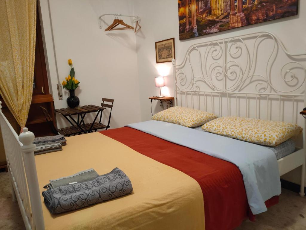 Łóżko lub łóżka w pokoju w obiekcie Roma Trastevere Station