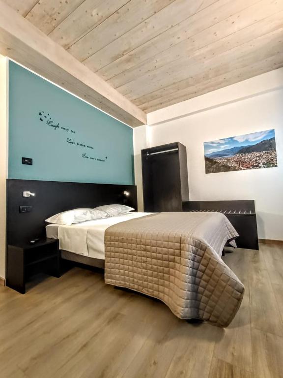 Postel nebo postele na pokoji v ubytování Il B&B di PIAZZA MOTTA