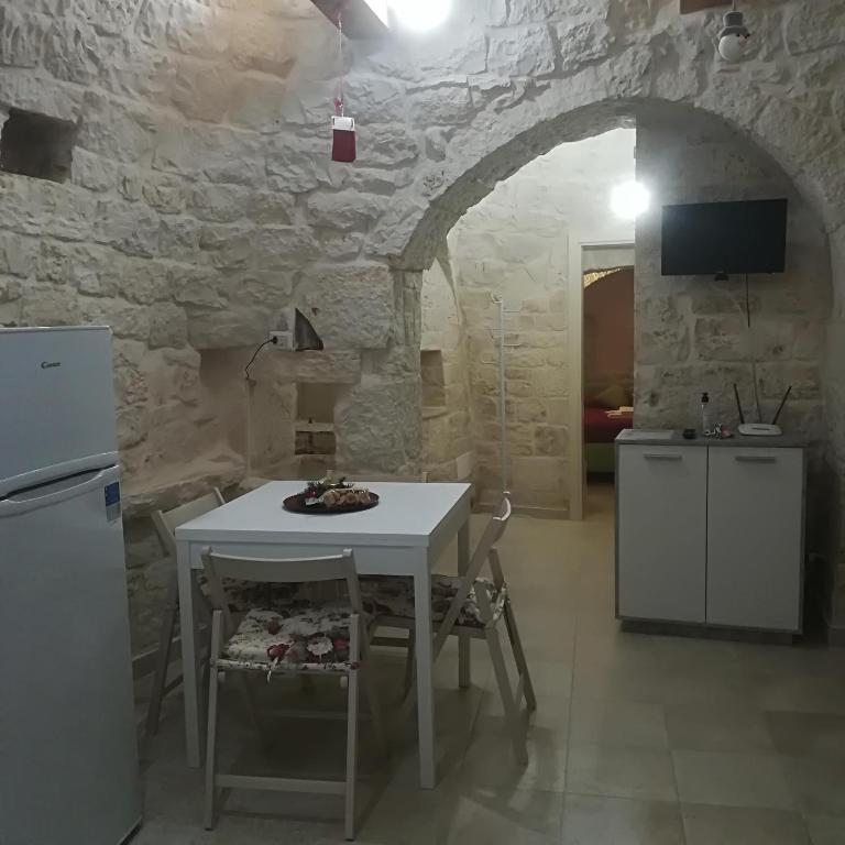 Kuchyň nebo kuchyňský kout v ubytování Trulli Manuela 2
