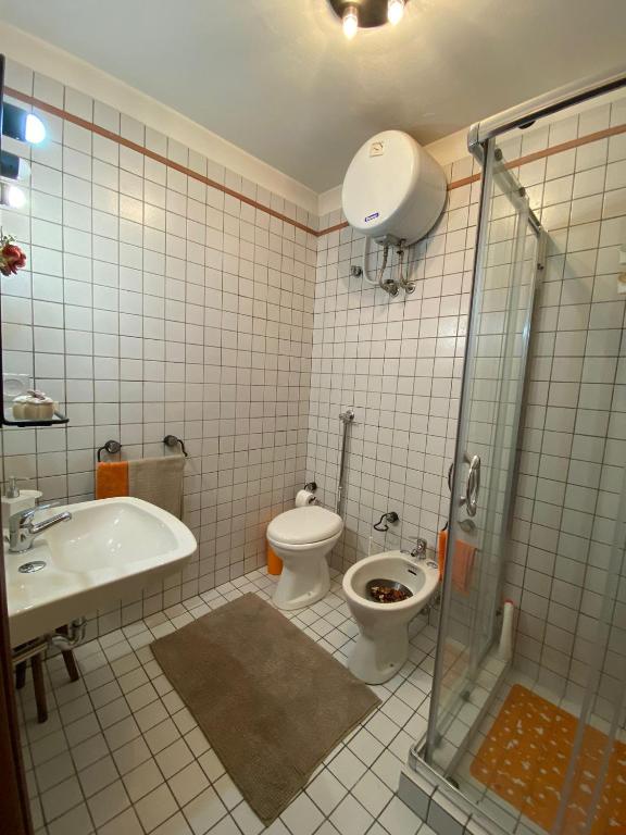Koupelna v ubytování A'MA CASA