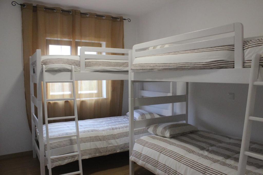 Postel nebo postele na pokoji v ubytování Casa Dona Alzira