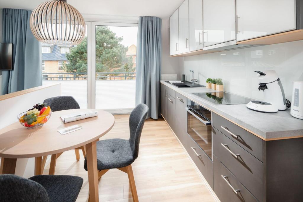 Kuchyň nebo kuchyňský kout v ubytování Apartmenthaus B3