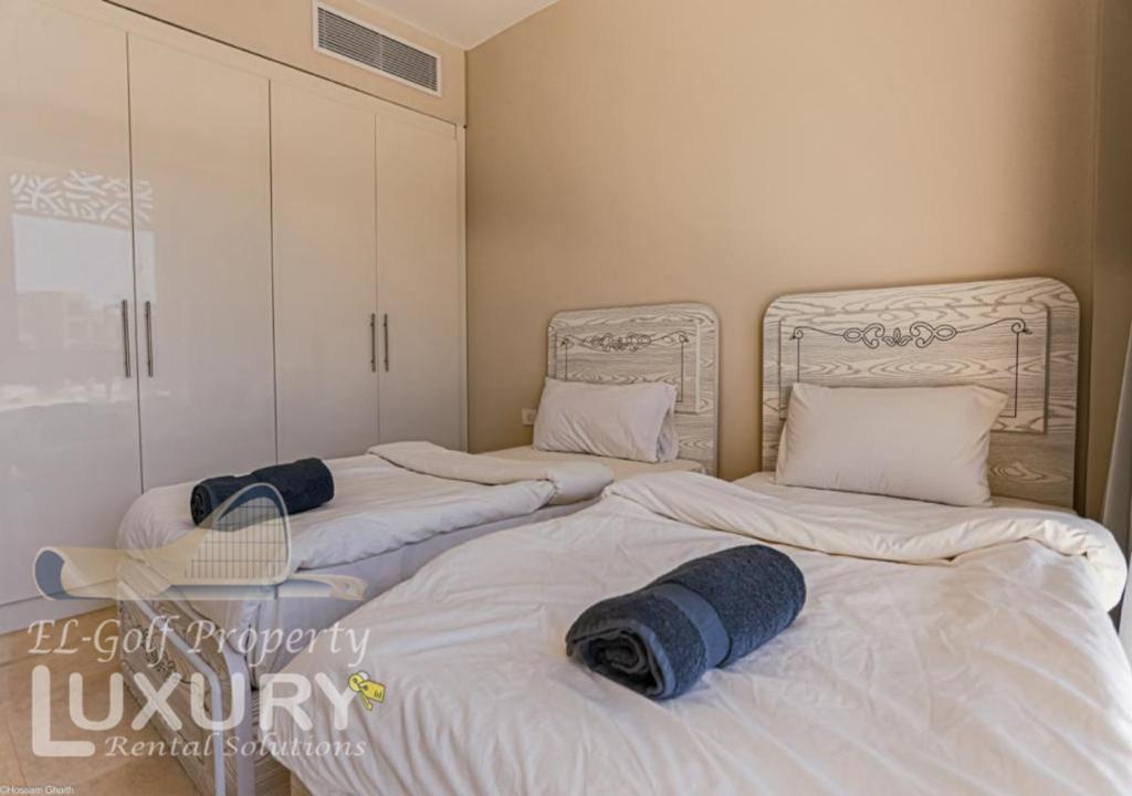 A bed or beds in a room at Mangarov-2BR. M1-6b-12