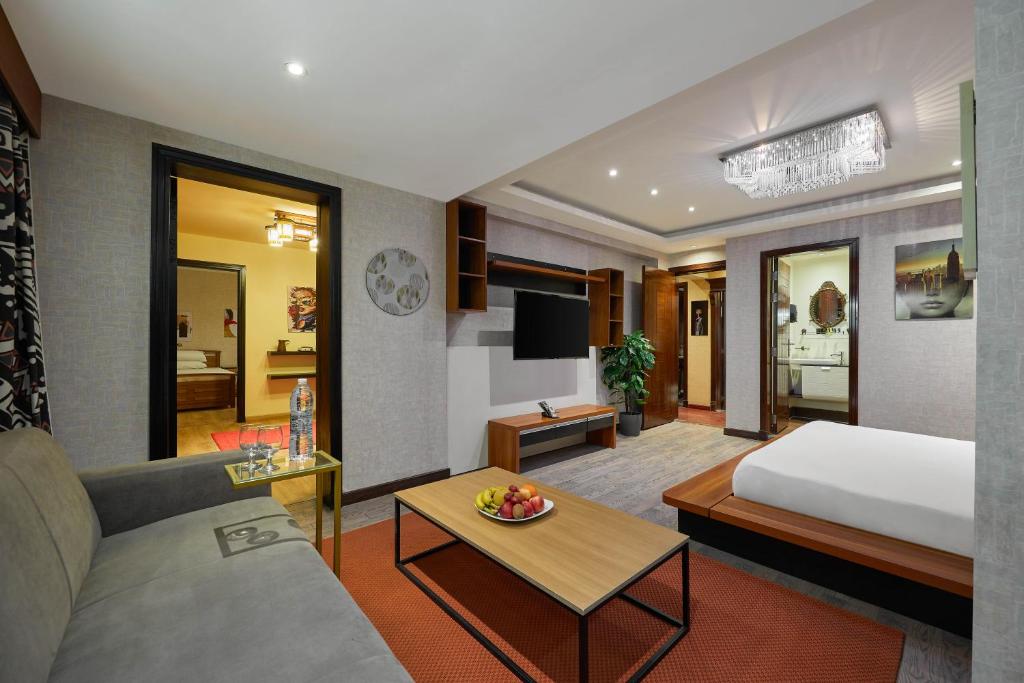 Postel nebo postele na pokoji v ubytování Golden Park Hotel Cairo, Heliopolis