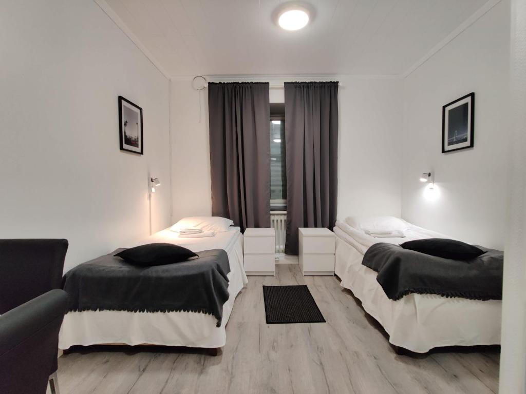 Posezení v ubytování Alexi Apartments - Newly Renovated Apt in the Heart of the City near to Railway Station and Nokia Arena