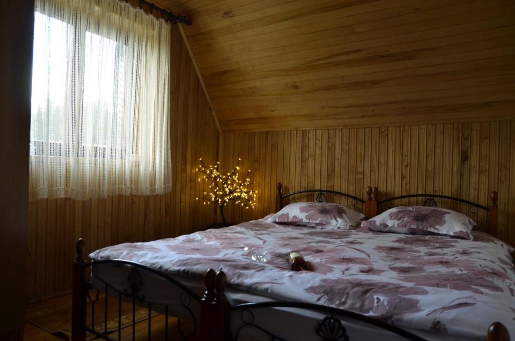Postel nebo postele na pokoji v ubytování Vila Šapat šume