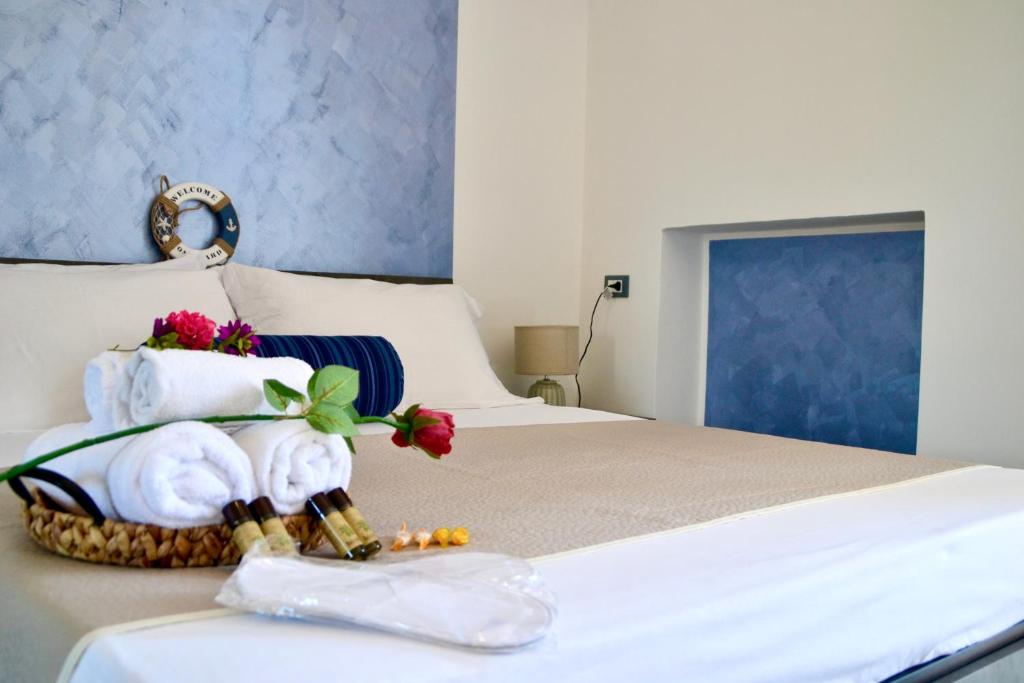 Postel nebo postele na pokoji v ubytování Sperlonga Paradise Suites 500m dal mare in estate Servizio navetta per Sperlonga centro