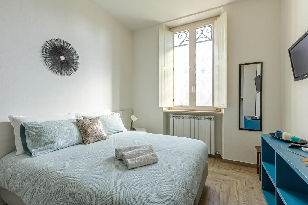 Łóżko lub łóżka w pokoju w obiekcie Al 33 di Via Roma - Apartments
