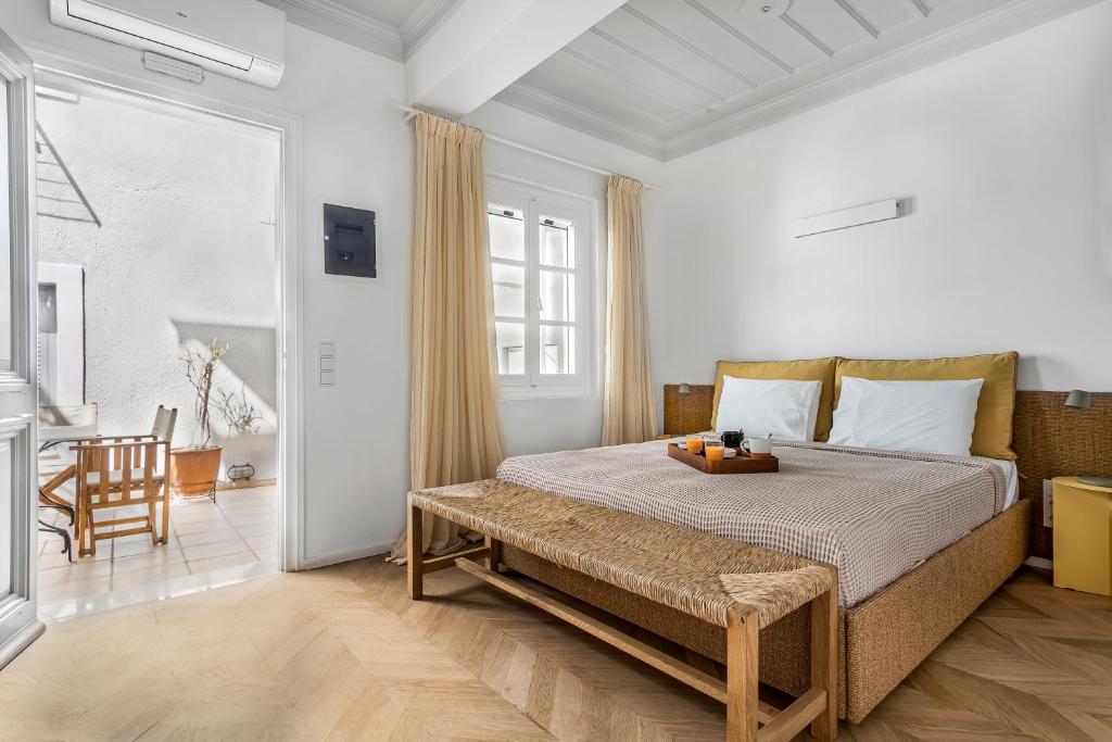 Postel nebo postele na pokoji v ubytování Guesthouse Niriides