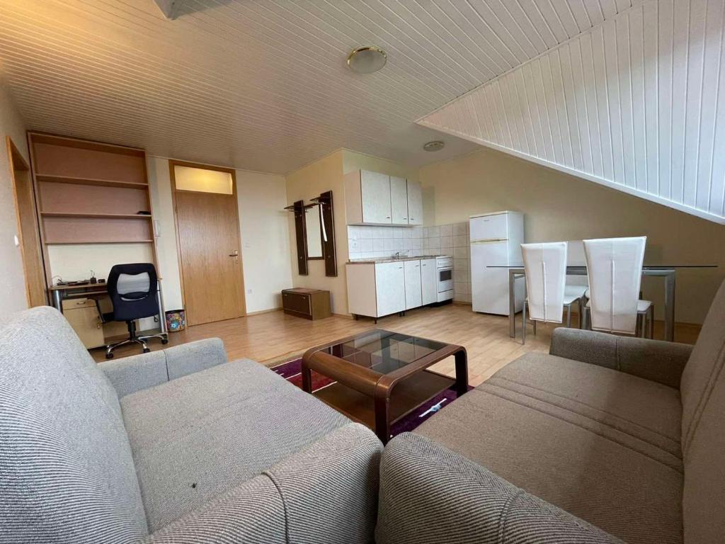 Posezení v ubytování Kegljišče VISOLE Apartmaji in Sobe