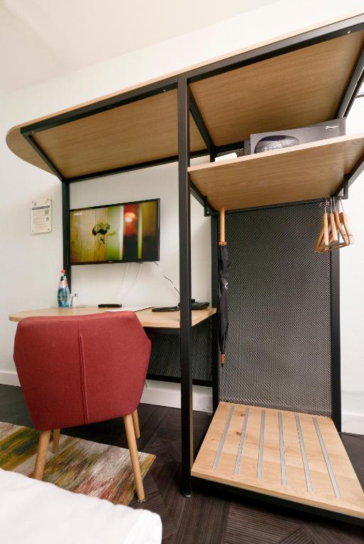 Postel nebo postele na pokoji v ubytování AMC Hotel - Schöneberg