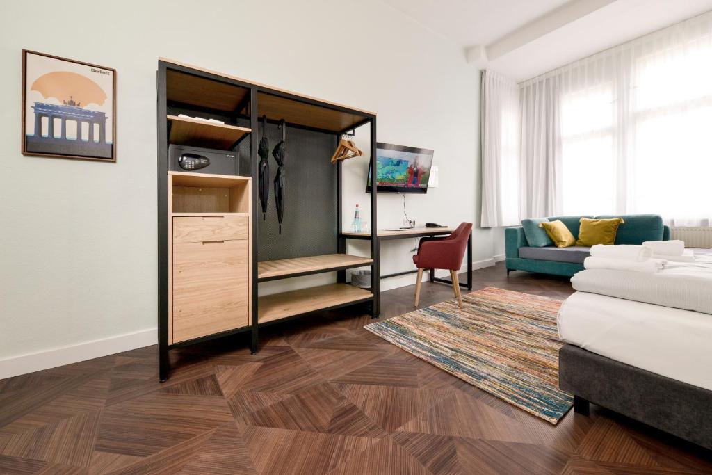 TV a/nebo společenská místnost v ubytování AMC Hotel - Schöneberg