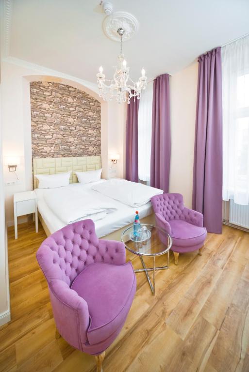 Postel nebo postele na pokoji v ubytování AMC Hotel - Schöneberg