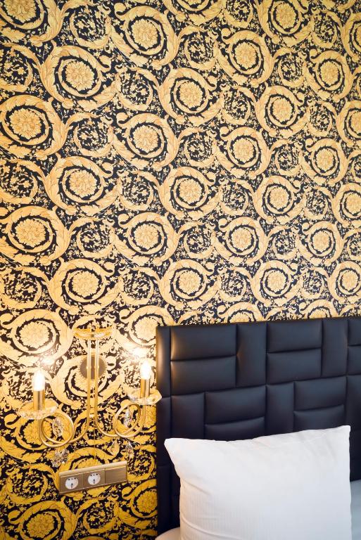 Postel nebo postele na pokoji v ubytování AMC Hotel - Schöneberg
