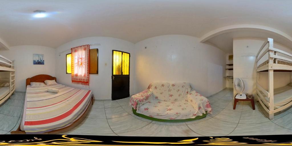 Postel nebo postele na pokoji v ubytování Arapiri Guest House