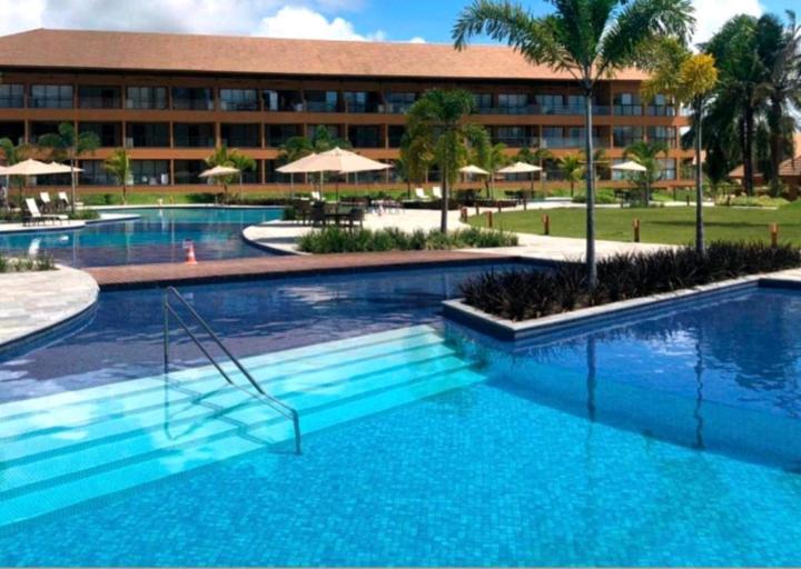 Majoituspaikassa Eco Resort Praia dos Carneiros - Flat 116CM, apartamento completo ao lado da igrejinha tai sen lähellä sijaitseva uima-allas