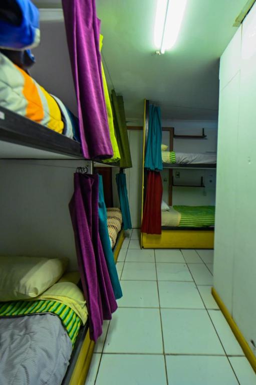 Postel nebo postele na pokoji v ubytování Gecko Hostel