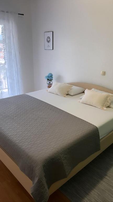 Postel nebo postele na pokoji v ubytování Apartments Mihi