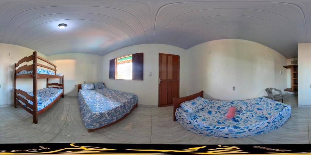 Postel nebo postele na pokoji v ubytování Arapiri Guest House