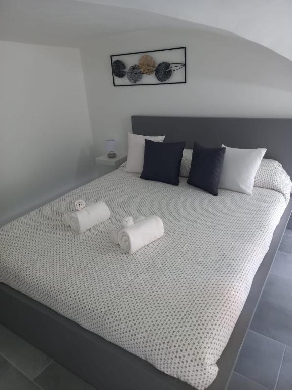 Posteľ alebo postele v izbe v ubytovaní Maya's Home