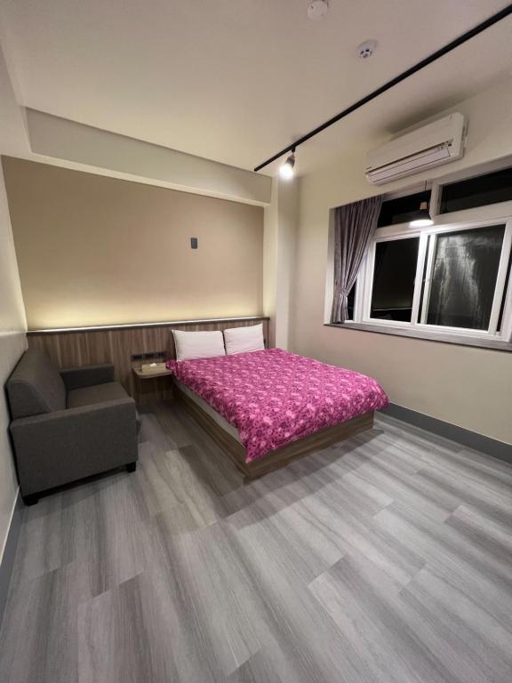 Postel nebo postele na pokoji v ubytování Nantou Xitou Riverside Homestay B&B