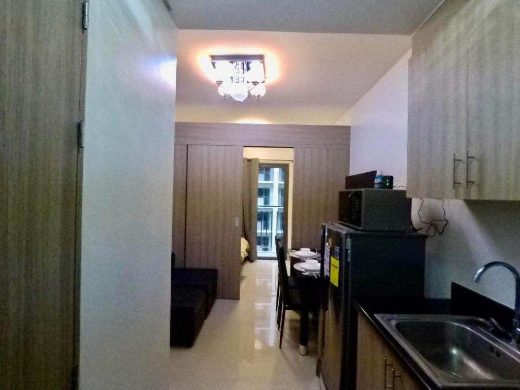 STAYCATION CONDOSORT Shore 2 Residences by RGA