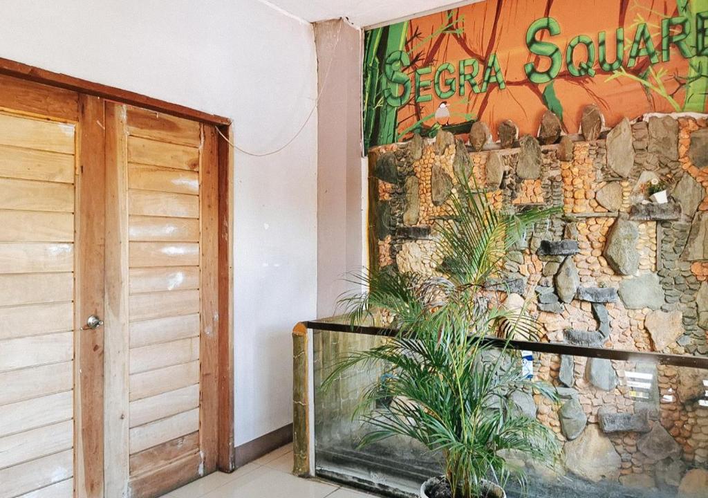Fotografie z fotogalerie ubytování RedDoorz Segra Square Pension House v destinaci Balamban