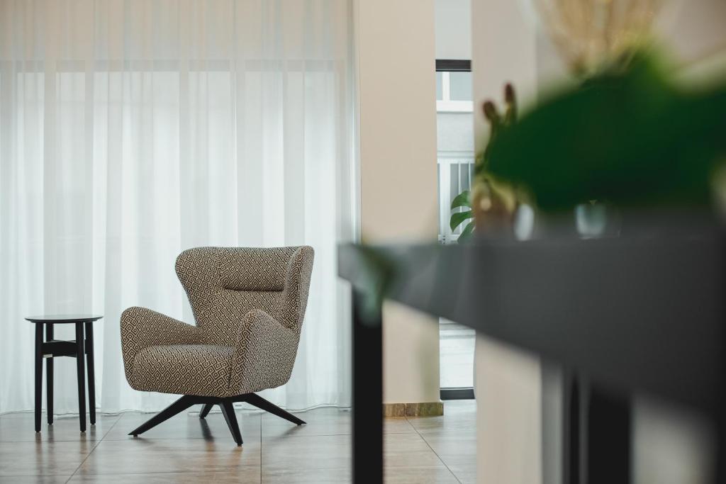 Posezení v ubytování Roseum Boutique Hotel