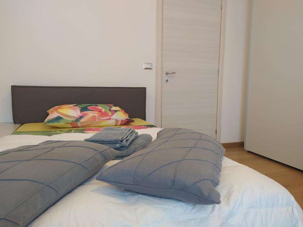 A bed or beds in a room at B&B Markone Bologna Center