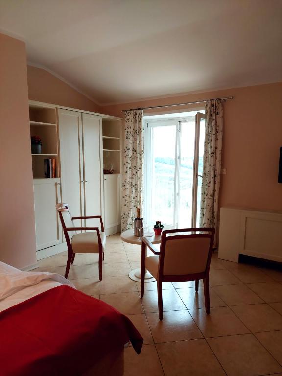 Postel nebo postele na pokoji v ubytování Hotel Kozana