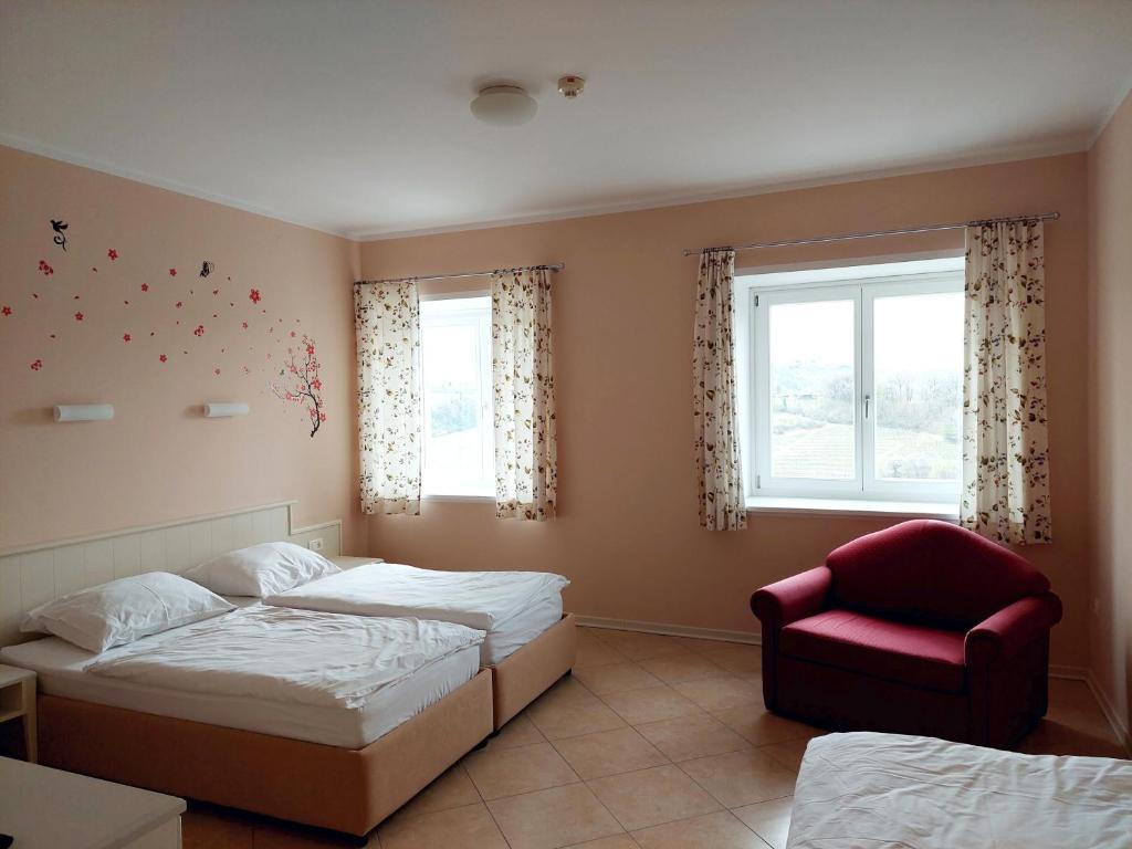 Postel nebo postele na pokoji v ubytování Hotel Kozana