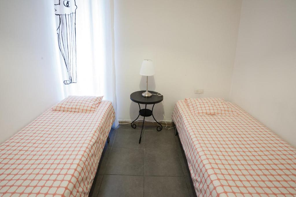 Cama o camas de una habitación en Barbieri Sol Hostel
