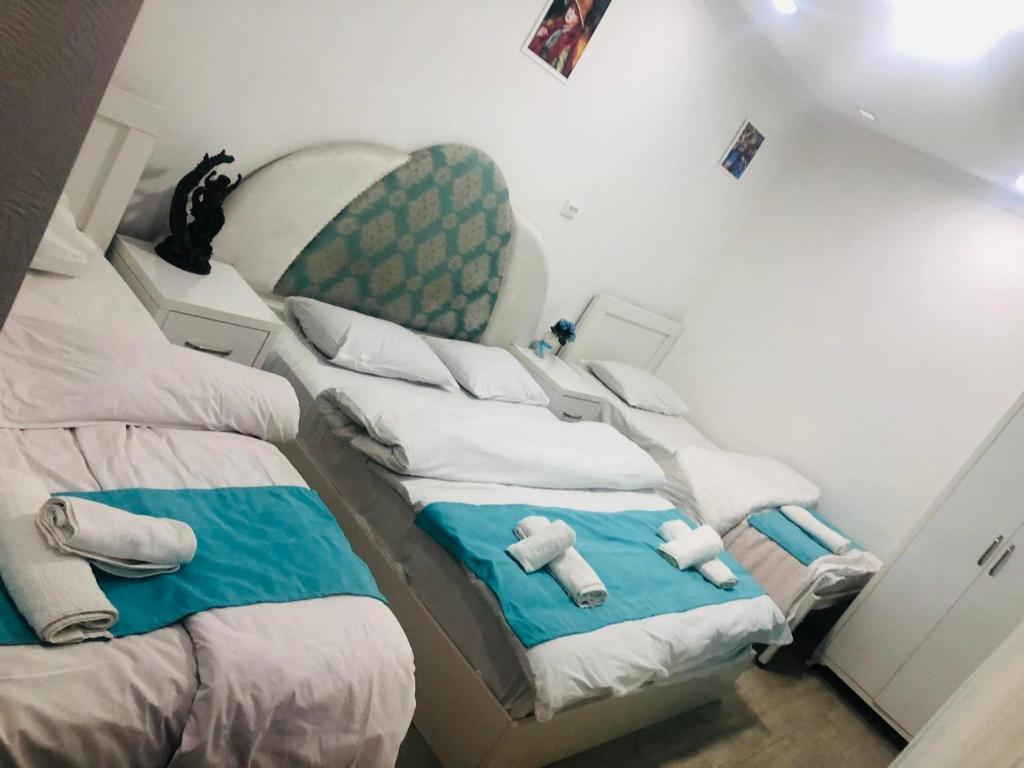 Postel nebo postele na pokoji v ubytování Nikas Guest House