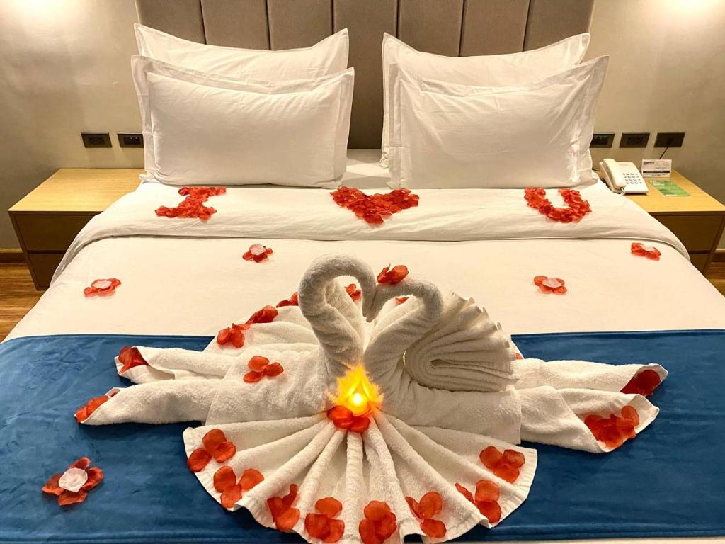 Postel nebo postele na pokoji v ubytování Bravo Tanauan Hotel
