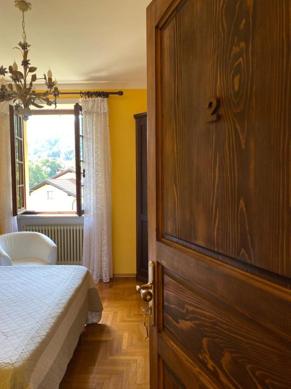 Postel nebo postele na pokoji v ubytování B&B Azalea