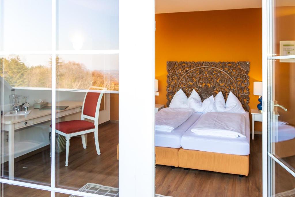 Posteľ alebo postele v izbe v ubytovaní Landhotel GUT MOSER