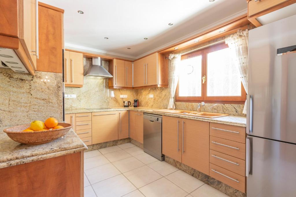 Kuchyň nebo kuchyňský kout v ubytování Villa Ana Sofía Costa CarpeDiem